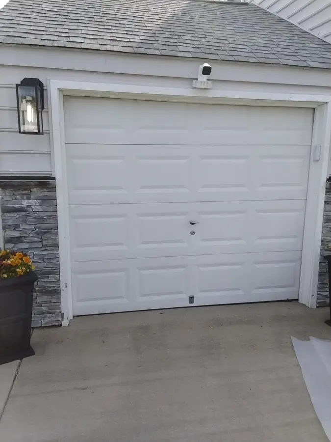 Before: aging white door on a Hampton Roads home